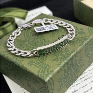 Gucci Women's Silver Bracelet with Green Accent